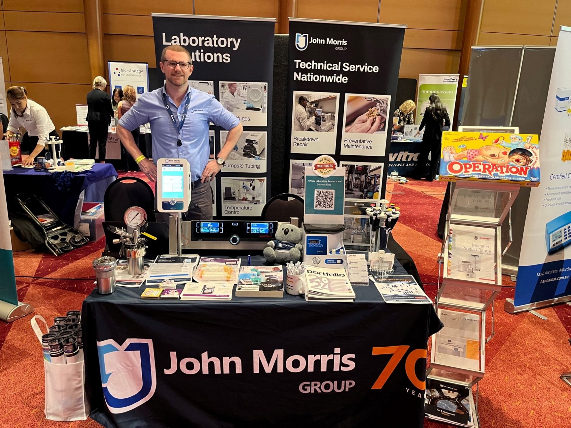 John Morris Group exhibition stand showcasing laboratory solutions including pumps, tubing, temperature control and technical service capabilities