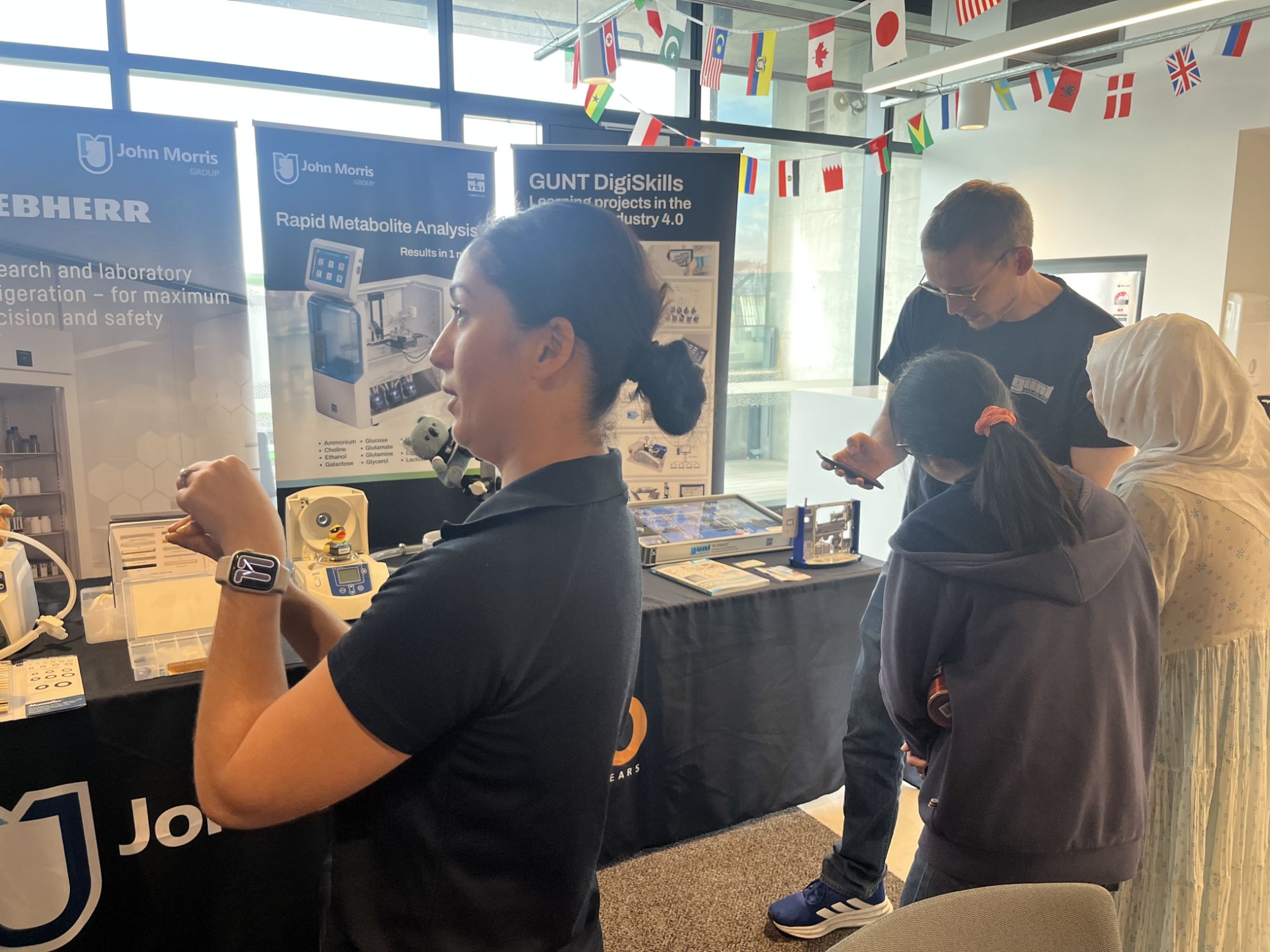 Laboratory equipment and technical education solutions displayed during the University of Queensland morning tea