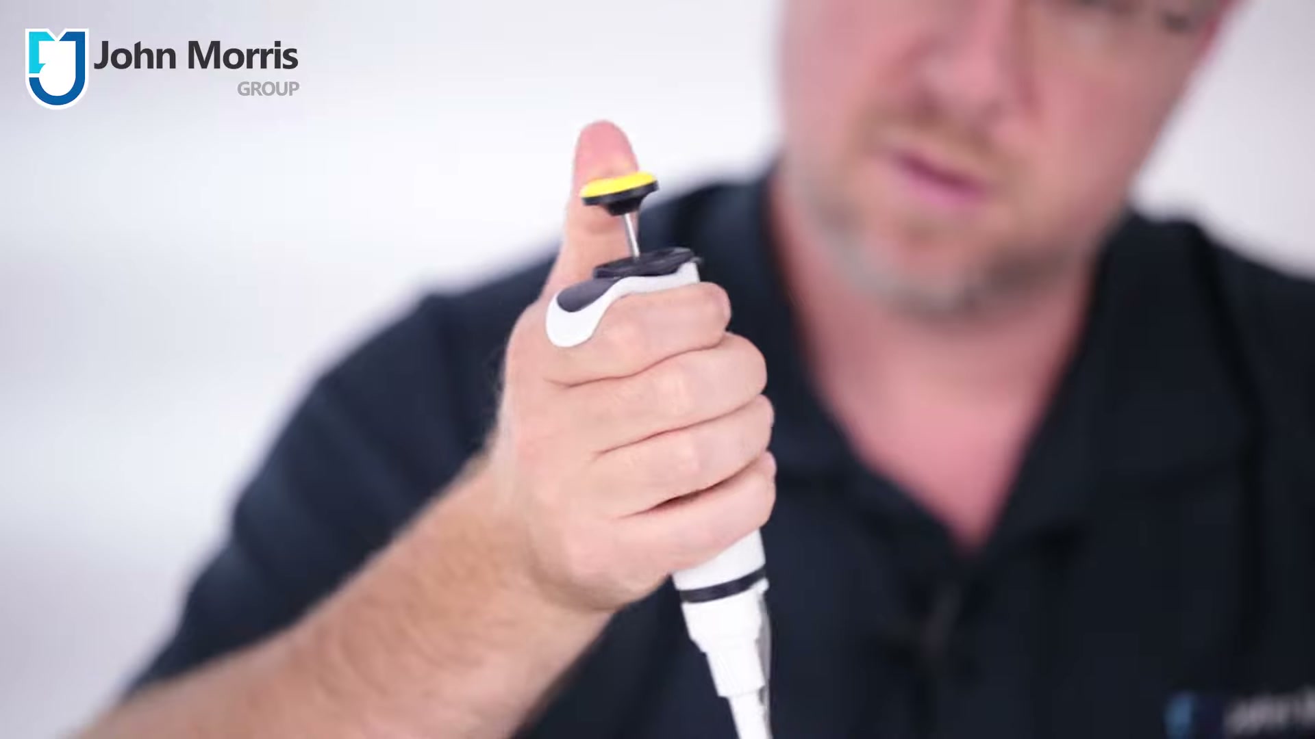 Finger hook and simplified tip ejector on a Gilson MyPIPETMAN, still from the John Morris Group video
