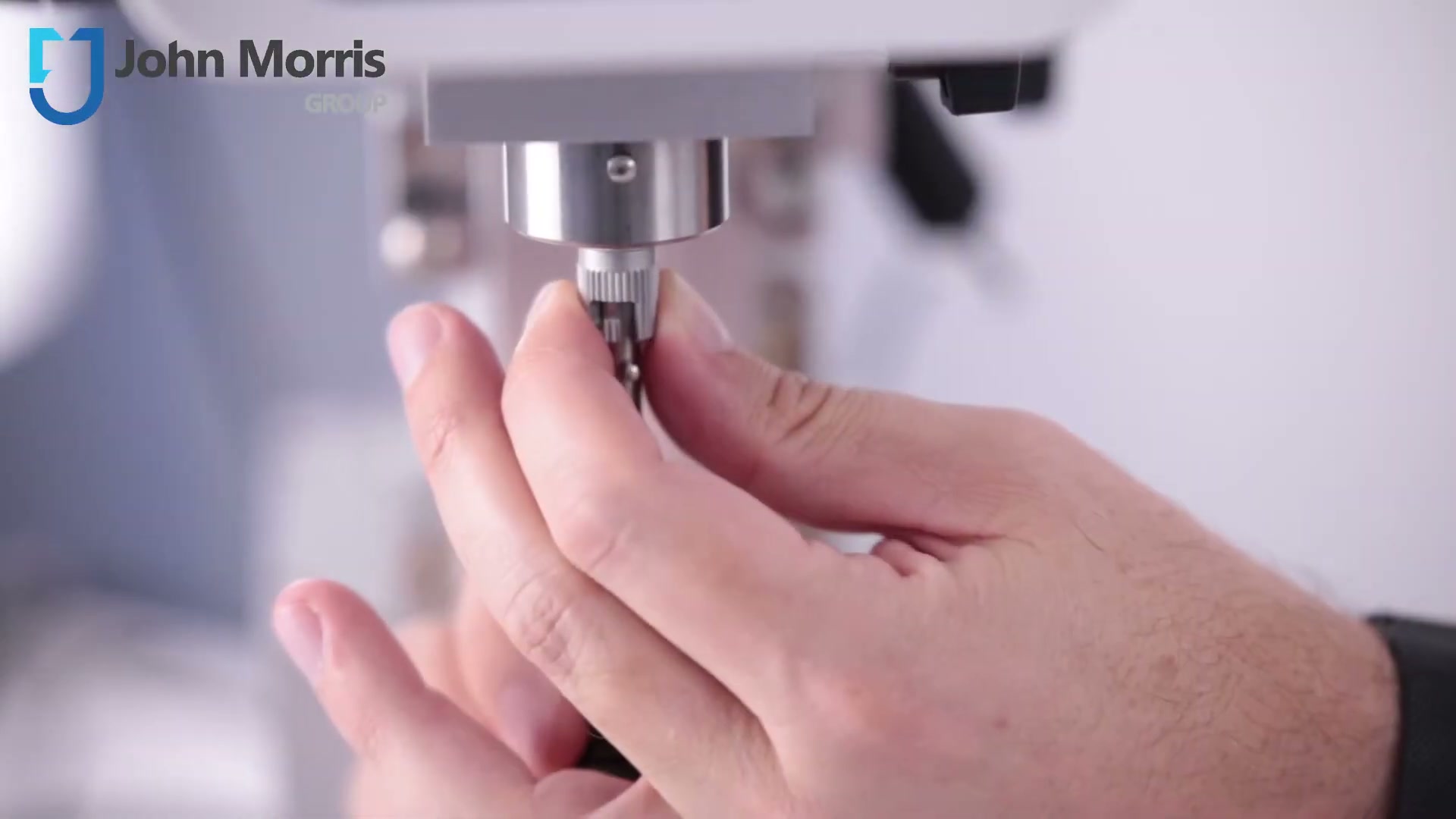 T-bar spindle being tightened into the machined chuck of the viscometer