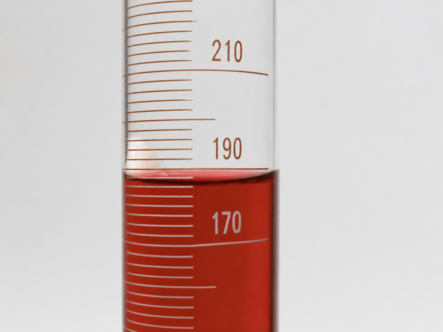 Graduated cylinder showing the liquid level from a verification calibration run after the volume was adjusted